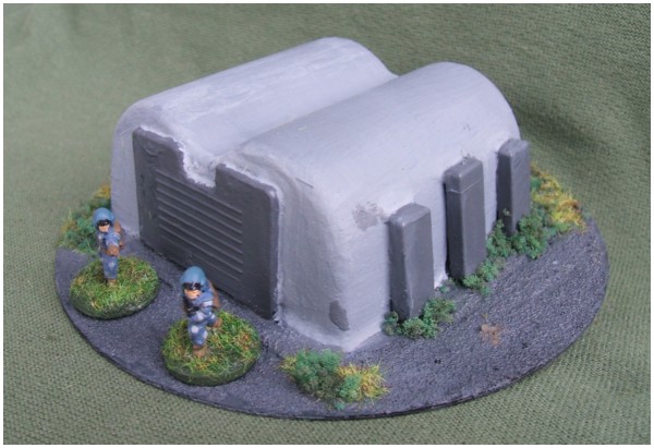 A small bunker or garage made from scrap