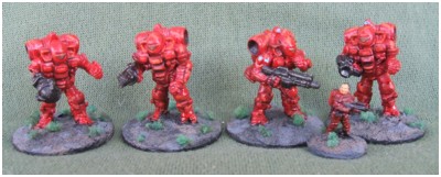 Cyclops Heavy Battlesuits from Ground Zero Games with a Rebel Minis 15mm Earthforce Marine for scale